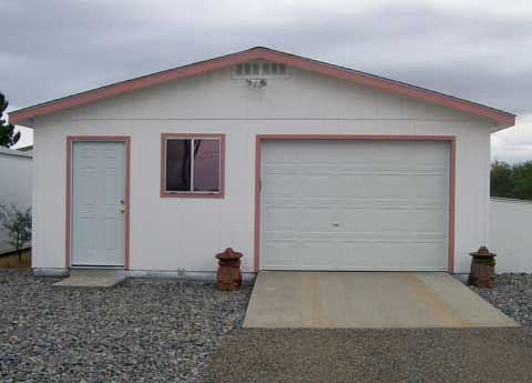 Garage with side door and overhead door