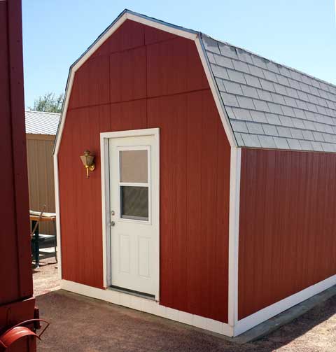 Gambrel barn shed with pre-hung house door