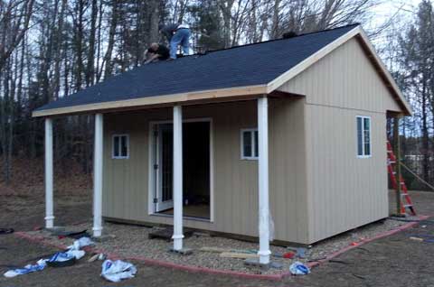 Deluxe gable shed with porches, double doors, and multiple windows