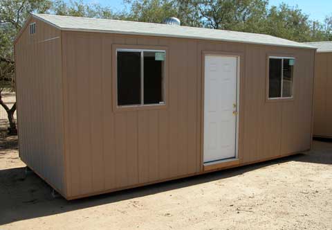 Gable shed with house door and two windows on side