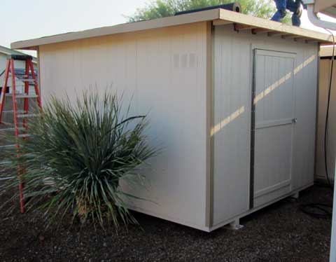 Single slope lean-to shed with typical side door